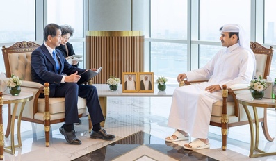 Saad bin Sherida Al Kaabi and Kenji Yamada